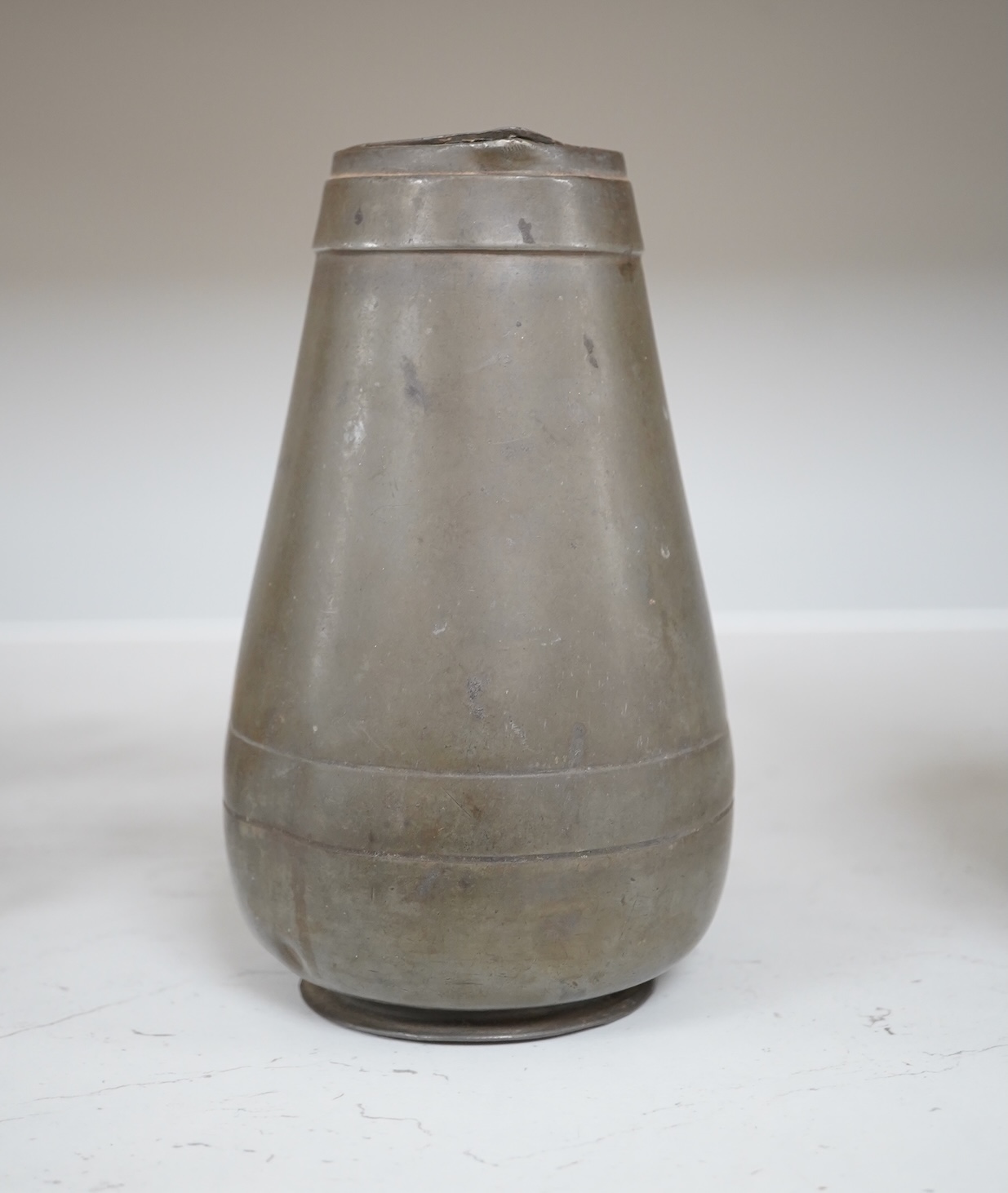 A Liberty Tudric pewter water jug, 17cm high. Condition - fair